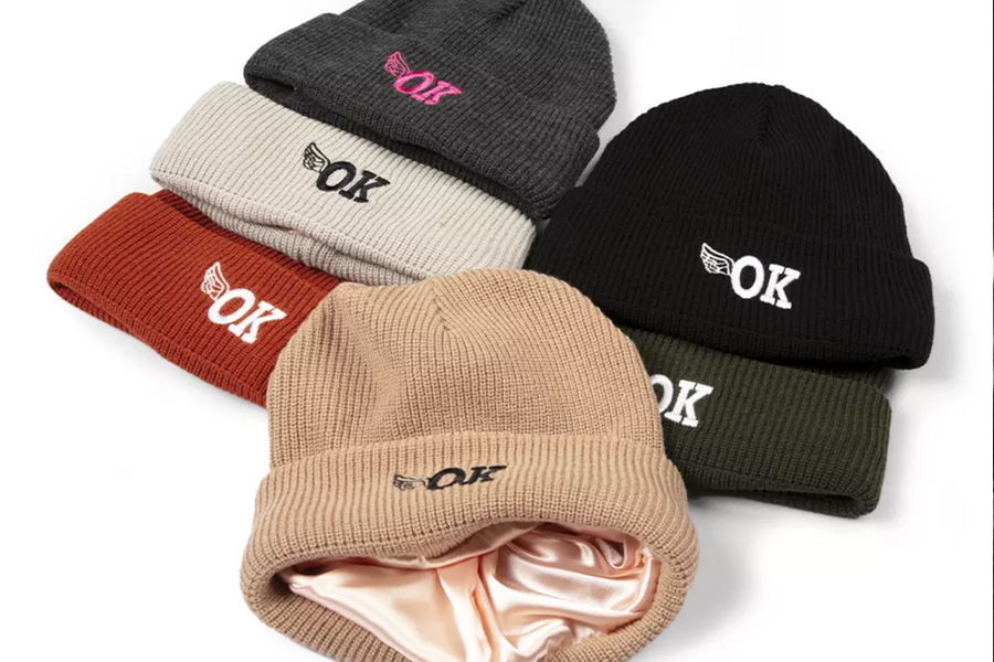 Different colors of knitted beanies lined with satin inside