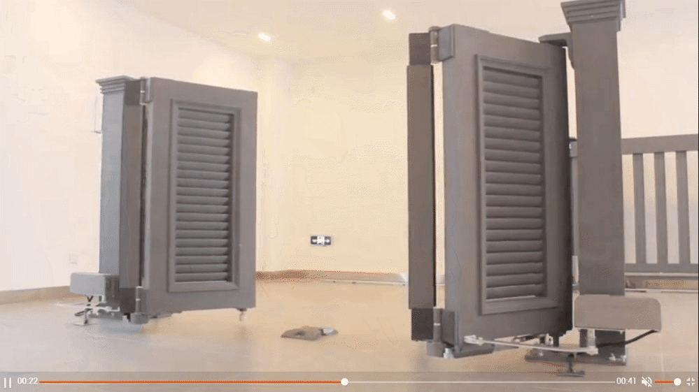 GIF of an articulated gate operator opening and closing a gate