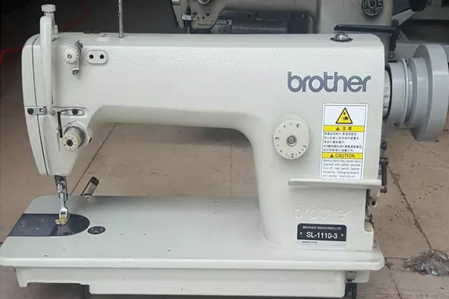 Gray-colored Brother sewing machine
