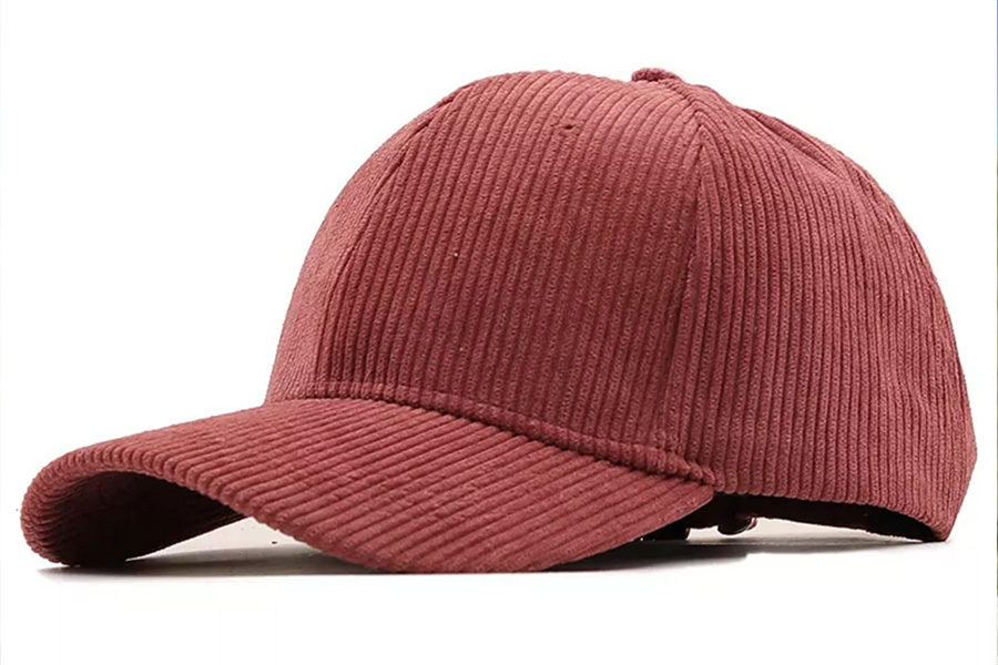 Men’s dark red corduroy baseball cap on white background