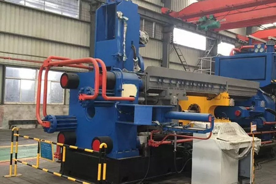 Metal extrusion machine in a factory