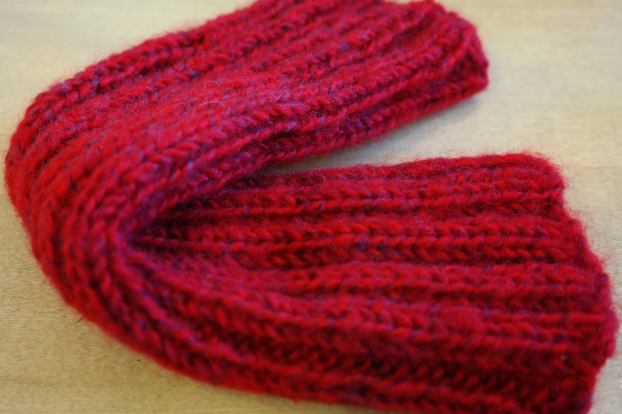 Red knit arm warmer