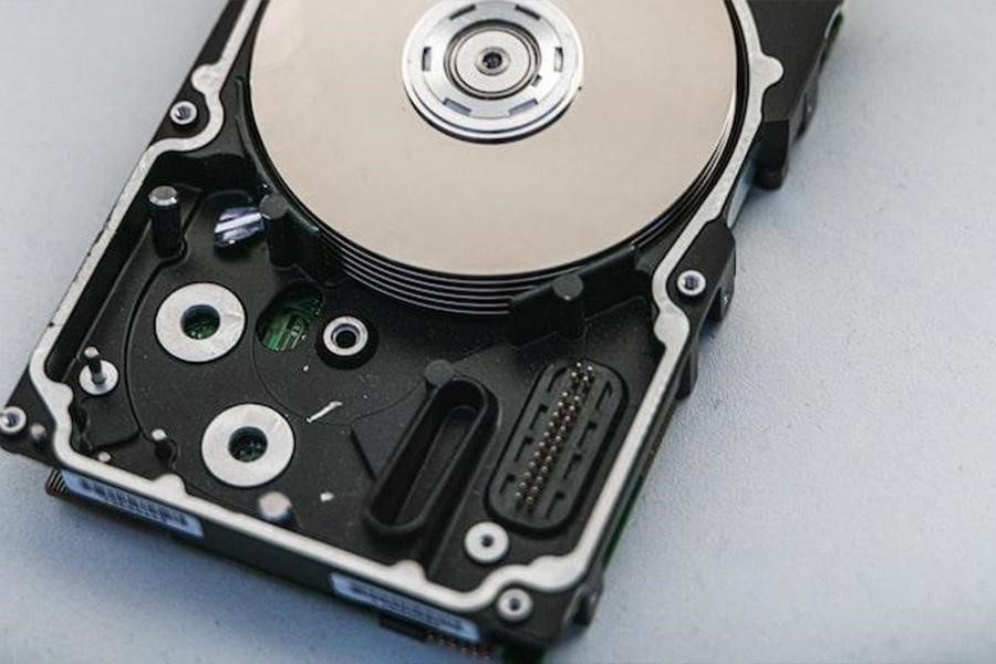 Silver and black hard disk drive