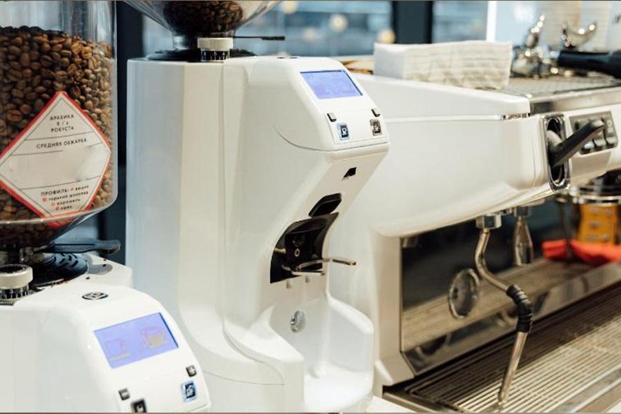 Smart coffee processing machine during operation
