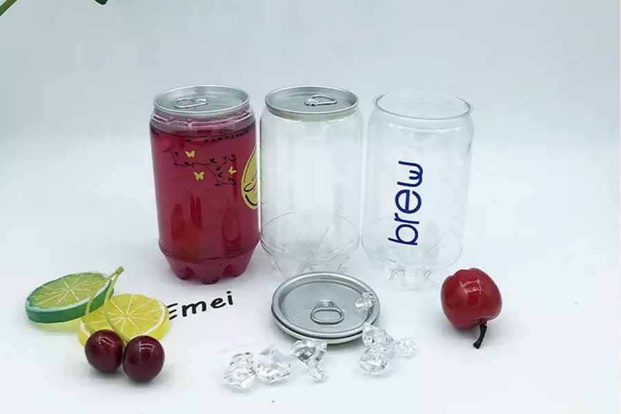 Transparent drink cans with fruit laid out in front