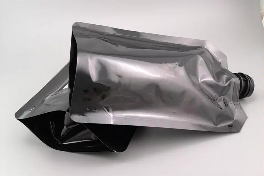 Two gray plastic pouches used to store liquid