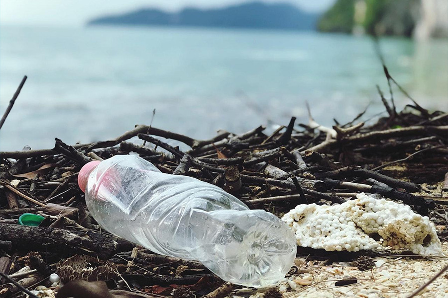 water bottle near the ocean