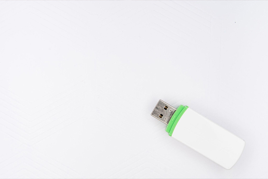 A white color USB flash drive
