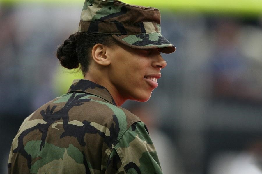 Woman wearing a full camouflage outfit