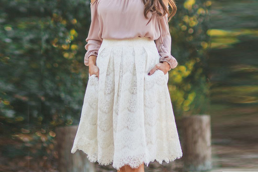 woman wearing a white lace skirt