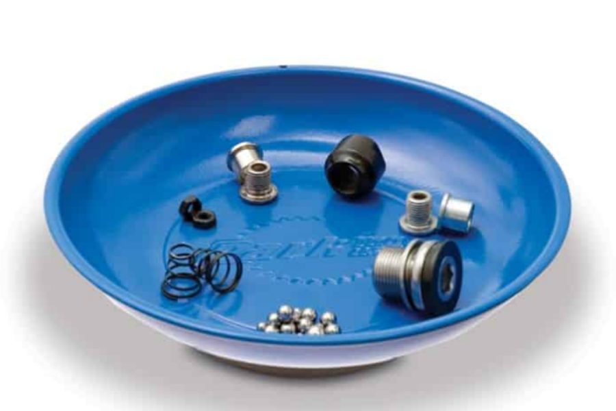 A blue-colored magnetic parts dish