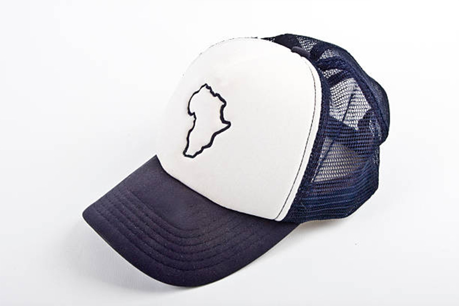 A blue trucker hat with a map of Africa