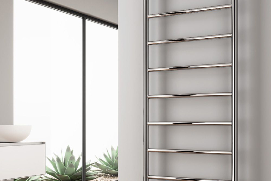 A central heated towel rail in a white space