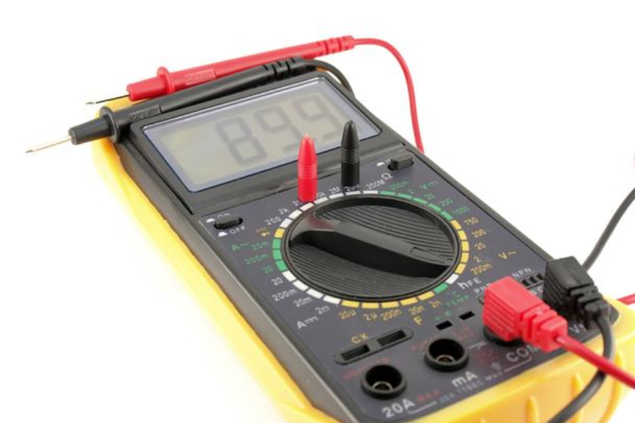 A digital multimeter on a white background