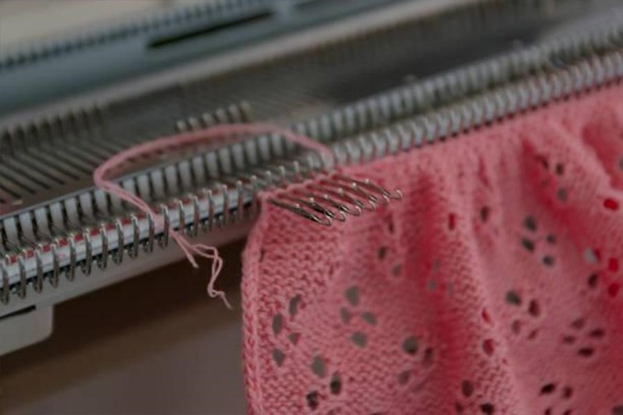 A knitting machine at work
