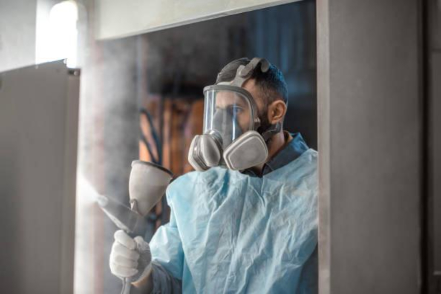 A painter in protective wear