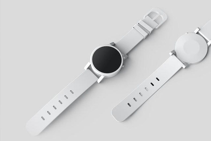 A smartwatch with white straps