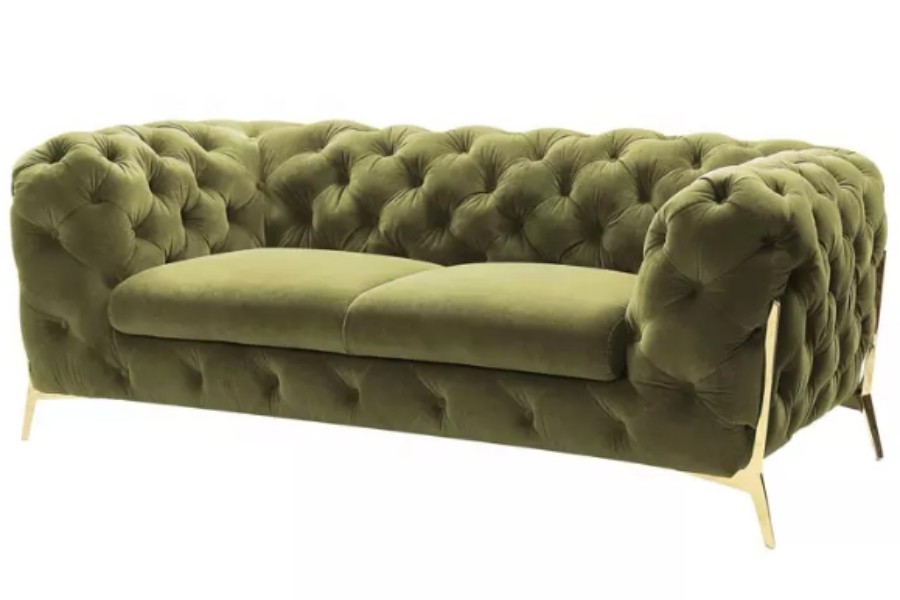 A two-seater, green velvet Chesterfield sofa