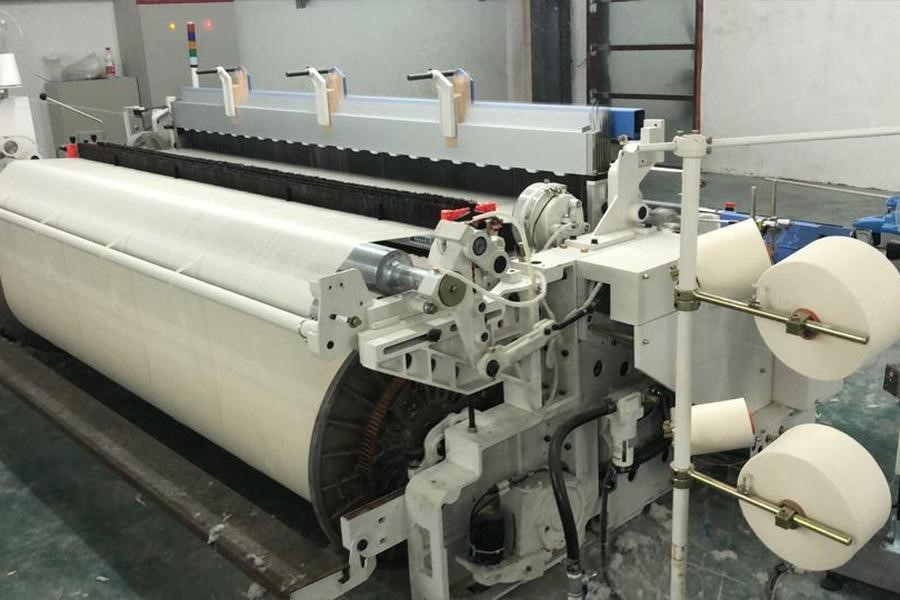 A weaving machine in a factory