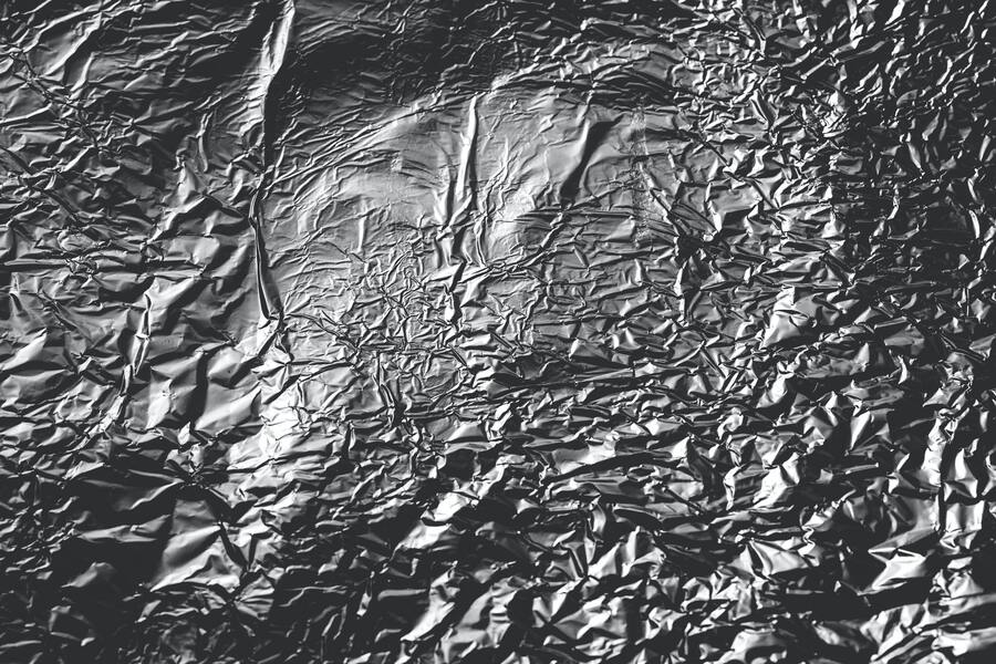 A wrinkled sheet of aluminum foill