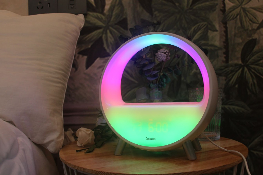 An LED night lamp by the bed