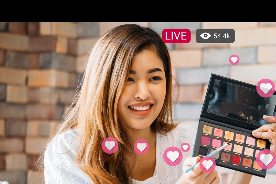 Beauty influencer using social media to market products