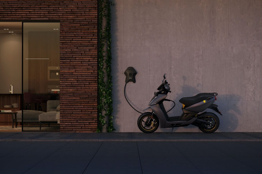 Electric motorcycle charging on road