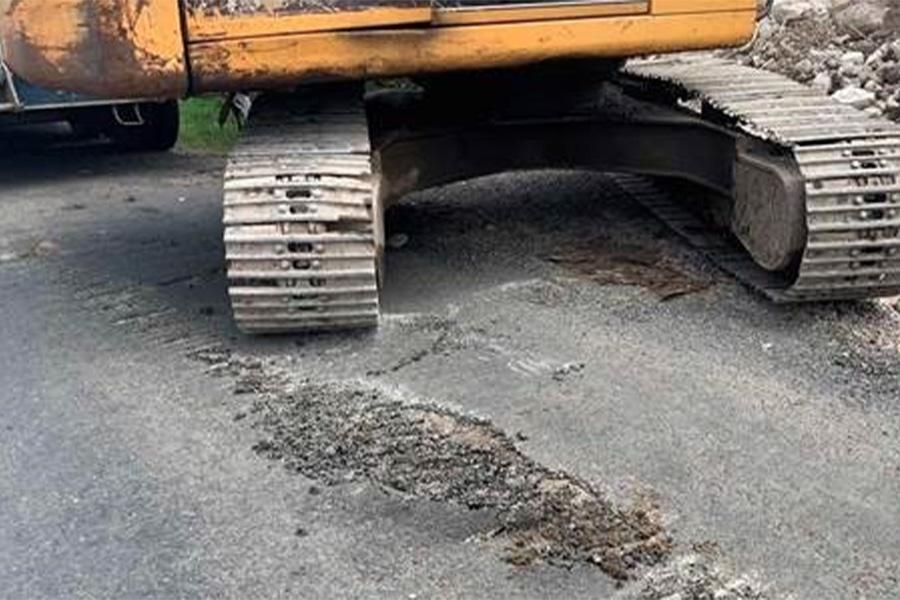 excavator tracks can damage the road surface