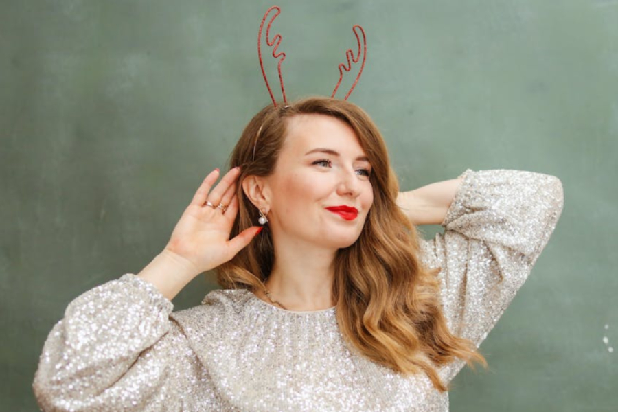Lady flaunting her reindeer headband