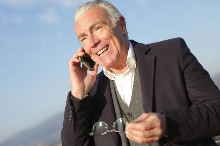 Mature man having a conversation on a smartphone