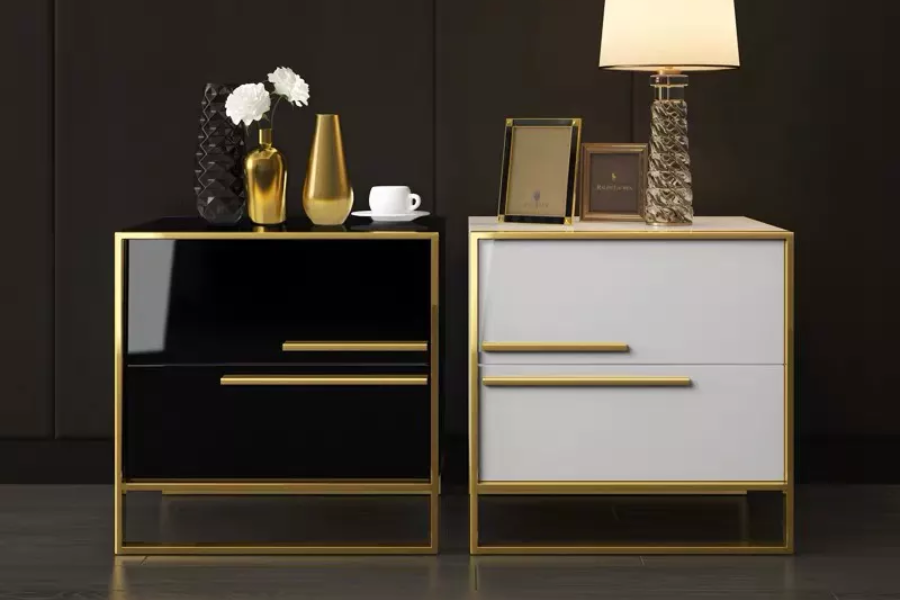 One black and one white glass nightstand with gold trim