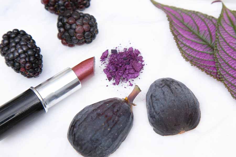 Purple lipstick on a white background