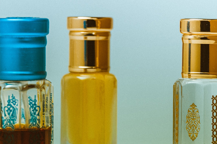Travel-sized perfume bottles sitting on a table