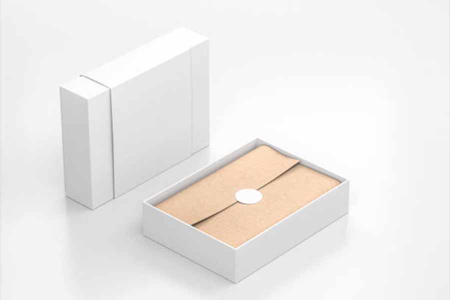 White gift box with brown paper packaging inside