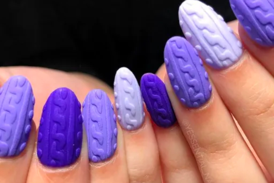 Woman showing textured nail polish