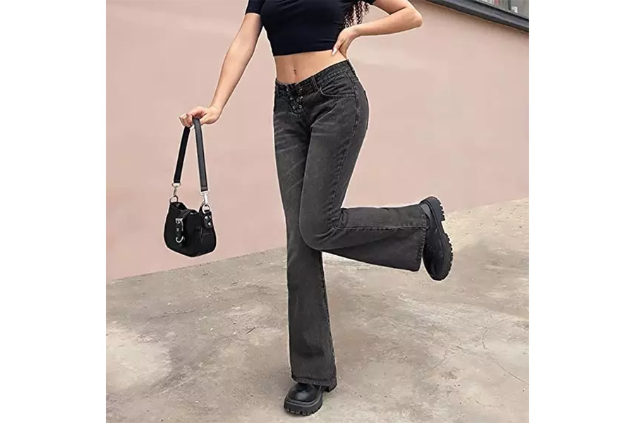 Woman wearing a black pair of boot-cut jeans