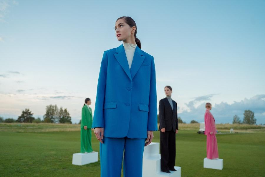 Women wearing colorful oversized suits
