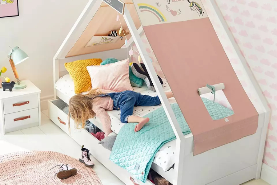 wooden kid’s cabin bed with storage