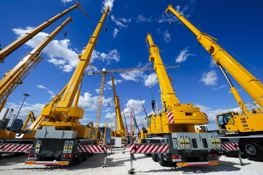A fleeet of mobile construction cranes
