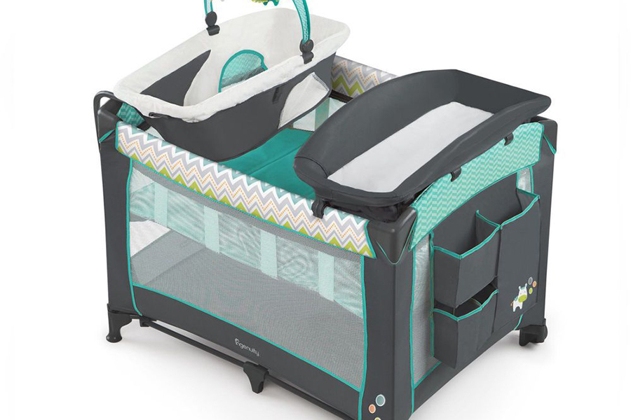 A gray-colored portable baby crib